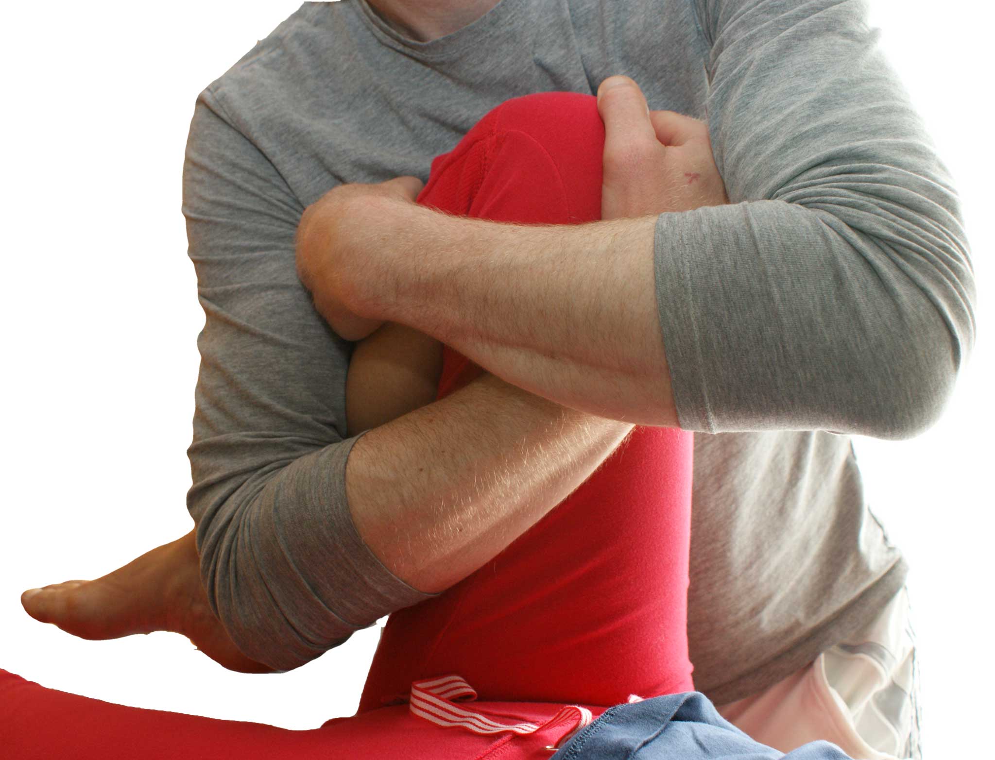 A Woman Holding a Person's Leg